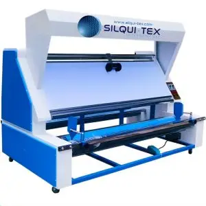 Revisadora de tela para control de calidad en procesos textiles. Ideal para tejidos planos o de punto. Incluye sistema de enrollado, iluminación superior y estructura metálica reforzada.
